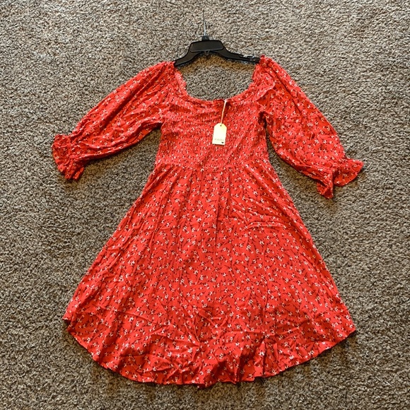 Red floral dress. Size small. Runs a little big due to smocking on the front. - Picture 6 of 6